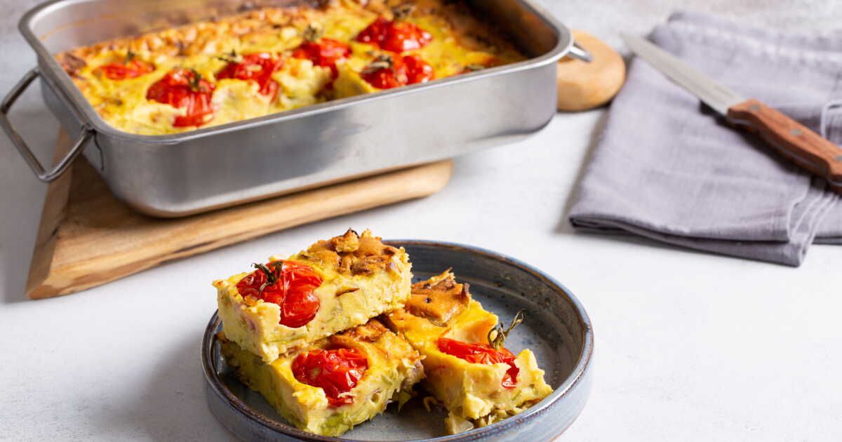 Un clafoutis salé aux tomates cerises pour un dîner léger et savoureux